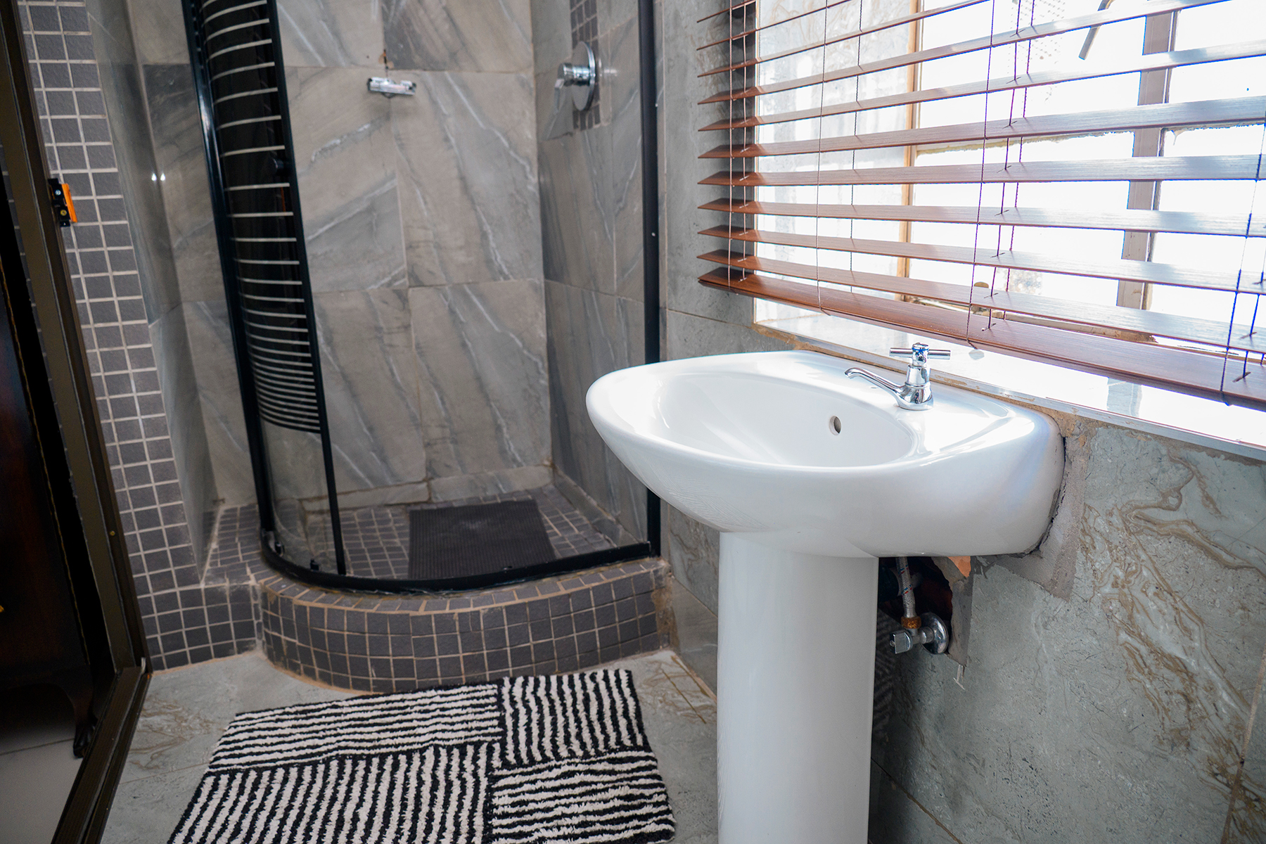 Clean guest bathroom prepared by housekeeping